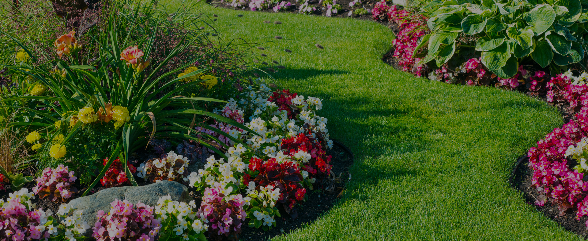 Lee's Summit Landscaping Service Landscaped Yard with Flowers and Plants